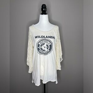 We the Free Tee Shirt with lace arms. Size Large.